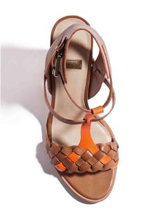 Retro T-strap Sandals For Spring, Bold Ankle Strap Sandals For Spring, Modern T-strap Heels For Summer, Spring Leather T-strap Heels, Leather T-strap Heels For Spring, Spring T-strap Sandals With Stacked Heel, Brown T-strap Heels For Summer, Summer T-strap Heels With Stacked Heel, Bold Leather Open Toe Sandals