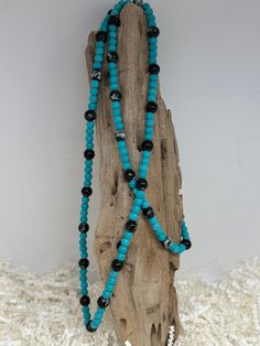 Beaded glass and Turquoise necklace. Long for layering. Spiritual Single Strand Turquoise Necklace, Turquoise Czech Glass Jewelry With Faceted Beads, Turquoise Faceted Beads Jewelry In Czech Glass, Turquoise Beaded Czech Glass Necklace, Turquoise Czech Glass Bead Jewelry, Turquoise Czech Glass Round Beads Jewelry, Adjustable Double Strand Turquoise Blue Necklace, Adjustable Double Strand Blue Turquoise Necklace, Turquoise Multi-strand Necklaces For The Beach