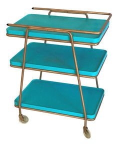 a three tiered blue tray with wheels