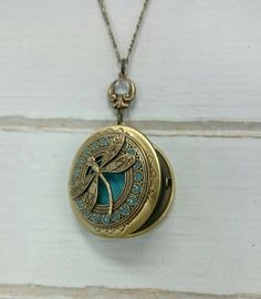 Tiffany Dragonfly Locket Necklace  antique brass by PinkLaLou Antique Finish Adjustable Wedding Jewelry, Adjustable Antique Finish Wedding Jewelry, Adjustable Vintage Necklace As Gift, Vintage Charm Jewelry Gift, Turquoise Locket For Wedding Jewelry, Turquoise Locket Jewelry For Wedding, Victorian Turquoise Jewelry For Wedding, Vintage Round Pendant Jewelry As A Gift, Vintage Round Pendant Jewelry Gift