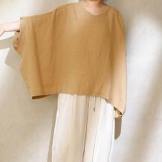 "Pure Linen Puffy Sleeve Blouse For Summer, Linen Blouse For Women, Oversized Fit Shirt Linen Top Casual Loose Linen Tops Plus Size Clothing SIZE LIST FREE SIZE: Lenght:63-65CM/24.8-25.5\" Bust:180CM/70.8\" Shipping Policies: All orders will take the fastest express delivery no extra shipping. Usually 10-15 days to arrive US. To Europe usually 10-20 days. Other countries usually 10-15 days. Safe and quick. This is washing instructions: Suitable for hand wash or machine washing softly Do not bleach Iron on low heat PCE dry cleaning available Tumble dry with low heat Return Policy Kindly cntact us for returning address. You can return the item to my address. When we receive the item may refund for the price of items. Thank you for your love:-)" Spring Oversized Blouse In Solid Color, Oversized Solid Color Blouse For Summer, Summer Oversized Solid Color Blouse, Oversized Blouse For Summer, Relaxed Fit Tunic Top In Lagenlook Style, Relaxed Fit Lagenlook Tunic Top, Oversized Spring Tunic Tops, Oversized Plain Blouse For Spring, Oversized Tunic Tops For Spring