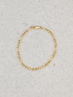 14k Gold-Filled Figaro Chain Sizing Guide: Click Here *Allow 3-5 business days for production before shipping as all of our pieces handmade* Everyday Oval Link Brass Chain Bracelet, Everyday Brass Oval Link Chain Bracelet, Everyday Brass Chain Bracelet With Oval Links, Metal Chain Link Bracelet With Figaro Chain, Everyday Metal Figaro Chain Bracelets, Metal Figaro Chain Link Bracelet, Everyday Figaro Chain Bracelet, Everyday Brass Bracelets, Tarnish Resistant, Everyday Tarnish Resistant Brass Bracelets