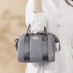 Our chic, lightweight, Multi-functional Diaper Bag is perfect as a hospital bag for essentials, traveling, and an all around stylish feel for all genders. Its water-resistant Polyester fabric is fundamental for on-the-go parents. Lightweight and versatile for short trips. Options to Carry: Handbag, Crossbody, Shoulder Bag. Spacious organization with big zipper and internal compartments. Durable, waterproof Polyester exterior, easy-to-clean interior, stroller-friendly design. Size 20 x 30 x 15 CM Wet Wipes, Hospital Bag, Diaper Bag Backpack, Mens Shoes Boots, Mini Crossbody Bag, Day Bag, Petite Women, Small Crossbody Bag, Small Crossbody