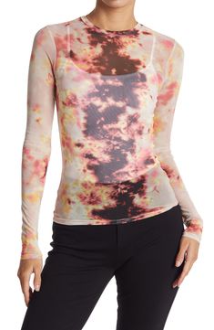 A vibrant printed mesh top brings chic, eye-catching style to any outfit. . Jewel neck. Long sleeves. Allover print. Mesh construction. Sheer. Slightly cropped. Approx. 23" length (size S). Imported Machine wash 95% polyester, 5% spandex Summer Party Fitted Long Sleeve Top, Fitted Long Sleeve Top For Summer Party, Chic Fitted Long Sleeve Mesh Top, Chic Fitted Long-sleeve Mesh Top, Fitted Long Sleeve Chic Mesh Top, Fitted Party Tops With Thumbholes, Spring Bodycon Long Sleeve Top, Bodycon Top For Night Out In Fall, Fall Bodycon Tops For Night Out