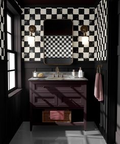 a black and white bathroom with checkered wallpaper on the walls, two sinks and mirrors