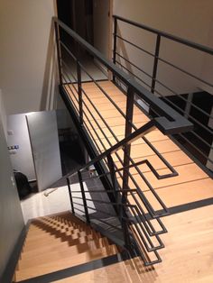 the stairs are made of metal and wood