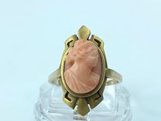 Art Nouveau 10K Yellow Gold Coral Cameo, hand carved a high detail delicate Coral Cameo in a deliated frame, ring top is 21.5mm, ring size 7, 4.1g, hallmark 10K Cameo Fine Jewelry Rings, Art Deco Cameo Ring For Collectors, Art Deco Cameo Ring Collectible, Art Deco Cameo Collectible Rings, Art Deco Carved Rings For Wedding, Antique Carved Collectible Ring, Victorian Yellow Gold Carved Rings, Art Deco Oval Cameo Rings, Victorian Carved Yellow Gold Rings