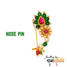 Maharashtrian Nath is a traditional nose ring worn by women in Maharashtra, India. It is typically made of gold and is often studded with precious stones such as diamonds, emeralds, and pearls. The design of the Nath varies depending on the region and community, but it usually consists of a large hoop that is supported by a chain that hooks onto the hair. The hoop is adorned with intricate designs and may have a small pendant hanging from it. The Maharashtrian Nath is an essential piece of jewellery for a Marathi bride and is often passed down as an heirloom from mother to daughter. It is also worn on special occasions such as weddings, festivals, and other cultural events. Important Note: This item is Imitation or Artificial Jewellery.  Artificial jewellery, also known as costume jeweller Temple Jewelry Nose Ring With Tilla As Gift, Temple Jewelry Style Nose Rings For Festivals, Temple Jewelry Nose Rings For Festivals, Traditional Chandbali Nose Rings As Gift, Temple Jewelry Chandbali Nose Ring For Puja, Temple Jewelry Nose Rings For Diwali Gift, Diwali Temple Jewelry Nose Rings Gift, Traditional Red Earrings For Rituals, Festive Tilla Nose Rings For Festivals