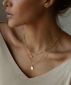 Extremely dainty, this necklace is perfect for a barely there look. The charm is solid 14k yellow gold. The chain is available in 14k gold filled (for a more budget friendly option) or in solid 14k gold. 14k Gold Filled Tarnish Resistant Fine Necklace, 14k Gold Tarnish-resistant Initial Necklace, 14k Gold Tarnish Resistant Chain Necklace With Round Pendant, Tarnish Resistant 14k Gold Chain Necklace With Round Pendant, 14k Gold Clavicle Chain Necklace With Round Pendant, 14k Rose Gold Chain Necklace With Round Pendant, Gold Sterling Silver Initial Necklace With Cable Chain, Gold Fine Jewelry Charm Necklace For Everyday, 14k Yellow Gold Tarnish Resistant Charm Necklace