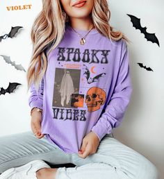 Thanks for checking out this Halloween 'Spooky Vibes' Shirt, with a cool collage vibe. It's the long Sleeve version of the Trendy Comfort Colors T-shirt. The graphic combines classic Halloween motifs laid out in the 90's and Y2K poster style.  For the Comfort Colors Long Sleeve Tshirt, The soft-washed, garment-dyed fabric has a weathered vintage look that hold up well, but soften over over time for a warm look. This fully customized tee is made 100% with ring-spun cotton. The double-needle stitc Halloween Horror Long Sleeve T-shirt, Horror Style Long Sleeve Tops For Streetwear, Horror Graphic Print Long Sleeve T-shirt, Horror Long Sleeve T-shirt For Fall, Spooky Long Sleeve Halloween Tops, Spooky Halloween Tops, Grunge Long Sleeve Halloween T-shirt, Oversized Long Sleeve Halloween T-shirt, Oversized Long Sleeve T-shirt For Halloween