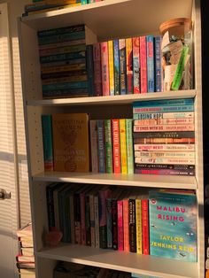 a book shelf filled with lots of books