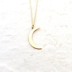 Solid bronze crescent moon pendant is hung on 14K Gold Filled chain. A simple celestial jewelry piece for everyday wear.Moon measures just over 1 inch tall (27mm).Necklace in pictures is 16 inches (40.64).As a symbol, the moon represents clarity and reflection. Her wisdom is gained through quiet introspection and contemplation of self as she reflects the light of the sun.\\\What is gold-filled?///Gold filled components are made in the USA and have a thick layer of gold. It is bonded to an inner Minimalist Half Moon Phase Necklace, Half Moon Brass Necklace For Gift, Everyday Minimalist Crescent Necklaces, Minimalist Crescent Necklaces For Everyday, Everyday Half Moon Charm Necklace, Minimalist Jewelry With Moon Charm, 14k Gold Filled Crescent Moon Necklace, Crescent Moon Charm Necklace In 14k Gold, Everyday Celestial Half Moon Necklace