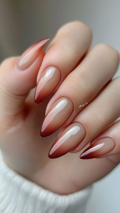 Gradient ombre nails in rust and beige bring cozy autumn vibes to your manicure. This subtle yet stunning combo is perfect for November! Click the pin and follow us for more fall nail inspiration. #NovemberNails #OmbreNails #FallNailDesigns #RustNails #NailInspo Autumn Nails With Design, Halloween Ombre Nails Acrylic, Dark Orange Ombre Nails, Red Gradient Nails Ombre, Autumn Oval Nails, November Nails Fall Simple, November Acrylic Nail Ideas, Fall Glitter Ombre Nails, Ombre Nail With Design