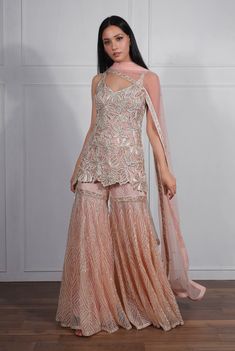 Luxury Art Silk Sharara With Floral Embroidery, Luxury Designer Sharara With Floral Embroidery, Luxury Pink Palazzo Set With Straight Kurta, Luxury Net Sharara For Party Wear, Luxury Bollywood Sharara With Stone Work, Luxury Sharara With Floral Embroidery, Luxury Net Sharara For Party, Luxury Embroidered Party Wear Sharara, Luxury Pink Silk Thread Sharara