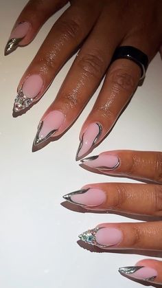 Pink nails with Chrome and Stones