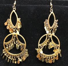 These are a fantastic rescue. We found hordes of old costume jewelry when we were recently digging in one of favorite warehouses on the east coast. These earrings are from the 1960's and we found them in the original packages without the findings to hang through your ear so we acquired some nice surgical steel gold color findings and made them into working earrings. They were made in India and are absolutely adorable they are made on a base metal (Gold color) and have nice glass seed beads as ad Vintage Metal Earrings For Festive Occasion, Vintage Pierced Earrings For Festive Occasions, Vintage Dangle Chandelier Earrings For Festive Occasions, Vintage Metal Chandelier Earrings For Festive Occasions, Vintage Chandelier Dangle Earrings For Festive Occasions, Festive Costume Jewelry Metal Earrings, Festive Metal Costume Jewelry Earrings, Vintage Festive Dangle Chandelier Earrings, Festive Metal Costume Earrings