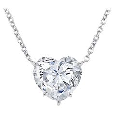 Exquisite diamond heart shape pendant necklace. This dazzling heart shape diamond weighing 2.01 carat is graded by the GIA H in color VS2 clarity. This diamond Is special and unique for being perfectly cut with an exceptional flow of translucency throughout the stone giving it an astonishing brilliance from every angle. While many heart shape diamonds aren’t a fully pronounced "heart”, This diamond is a fully pronounced heart shape attributed to it’s perfect cut. Set in our very own handmade pla Gold Open Heart Necklace, Heart Shaped Diamond Necklace, Rose Cut Diamond Pendant, Heart Shaped Diamond Pendant, Yellow Diamond Necklace, Heart Shaped Diamond Ring, White Gold Pendant Necklace, Heart Shaped Pendant Necklace, Heart Shaped Pendant