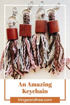 three keychains made out of yarn and wood with the words an amazing keychain