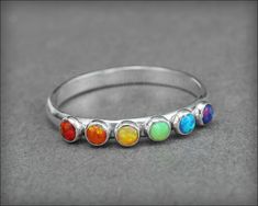 Multi Opal Ring - (choose # of opals) – LE Jewelry Designs Nickel Free Sterling Silver Stackable Rings, Adjustable Rainbow Gemstone Ring, Silver Opal Stackable Rings As Gift, Nickel-free Sterling Silver Promise Ring, Adjustable Opal Ring With Round Stone, Rainbow Multi-stone Jewelry For Promise Ring, Spiritual Sterling Silver Round Birthstone Ring, Sterling Silver Opal Ring Gift, Silver Multi-stone Opal Ring As Gift