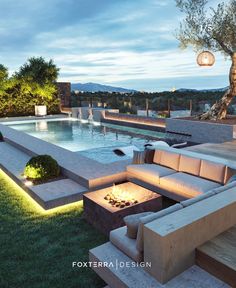 an outdoor fire pit next to a swimming pool