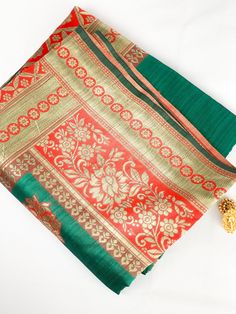 Traditional saree with blend of emeral green with red & gold border. This stunning saree includes a matching unstitched blouse piece which is customisable to fit all sizes. If you require the blouse to be stiched, We offer tailor service on request with additional cost. For more info please contact us and we will be happy to help.  🥻Occasion: Party, Sangeet, Wedding, Engagement, Outings, Mehndi, Bridal & festival. 🚚 Shipping : We offer International fast & secure shipping (Ask for more info) **Color may differ due to photography in light effect** Green Pre-draped Saree With Dupatta, Festive Green Chanderi Pre-draped Saree, Traditional Drape Green Salwar Kameez With Cutdana, Traditional Green Salwar Kameez With Cutdana, Green Salwar Kameez With Cutdana In Traditional Drape, Green Dola Silk Pre-draped Saree With Dupatta, Diwali Green Sharara With Cutdana Details, Festive Green Pre-draped Saree With Pallu, Green Art Silk Sharara With Cutdana