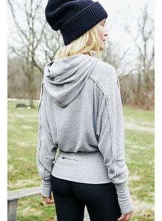 So soft slouchy hoodie featured in an oversized fit with a wide waistband and dolman sleeves. Drawstring hood Ribbed elastic waist detail Exposed seams FP Movement A destination for the life well-lived, Free People Movement offers performance-ready activewear, practice-perfect styles and beyond-the-gym staples. We believe in the power of community, in supporting and lifting each other up and always #movingtogether. Care/Import Machine Wash Cold Import Measurements for size small Bust: 48 in Leng Dolman Jacket Outfit, Dolman Jacket, Free People Activewear, Athletic Sweatshirts, Mommy Style, Belted Jacket, Workout Hoodie, Drawstring Hoodie, Wide Waistband