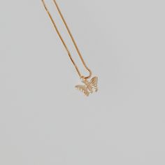 This butterfly necklace will add a delicate touch to any look with its chain and pendant. Treat yourself or a loved one to a unique piece of jewelry today! ∙ D E T A I LS ∙- 18k Gold Filled- 18 inches in length- Box Chain - Hypoallergenic (lead + nickel free) ∙ G O L D ∙ F I L L E D ∙ Gold-filled components contain 100+ times more real gold than gold-plated components and are both durable and tarnish resistant. It is more affordable and accessible than solid gold but higher quality than gold plated. Butterfly Shaped Rose Gold Jewelry Gift, Butterfly Shaped Rose Gold Jewelry For Gifts, Rose Gold Butterfly Jewelry Gift, Rose Gold Butterfly Jewelry For Gifts, Rose Gold Butterfly Charm Jewelry As Gift, Rose Gold Jewelry With Butterfly Charm As Gift, Butterfly Charm Pendant Necklace As Gift, Butterfly Charm Pendant Necklace For Gift, Everyday Gold Butterfly-shaped Jewelry