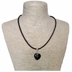 Lightweight and unique, Black Obsidian heart necklace. A gorgeous gift for a Birthday, Valentine's Day, Christmas or any special occasion.  A versatile necklace that can be worn daytime or evening, dress up or dress down. The black semi-precious Rainbow Obsidian heart bead is threaded onto a sterling silver bail and attached to black faux suede cord to make a gorgeous choker style necklace. The necklace fastens at the back with a sterling silver bolt ring clasp and features a 2 inch sterling silver extender chain (with tiny flat heart at the end) to adjust the length. [ All findings are 925 Sterling Silver ] Your necklace will come in an organza bag. [ Please be aware that natural crystals and semi-precious stones often have marks and perceived flaws; these are, in my opinion, part of thei Necklace With Black String, Spiritual Heart Beads Necklaces As Gifts, Spiritual Necklace With Heart Beads For Gifts, Spiritual Necklaces With Heart Beads For Gifts, Black Necklaces For Anniversary On Valentine's Day, Black Necklace For Anniversary On Valentine's Day, Valentine's Day Black Necklace For Anniversary, Spiritual Crystal Necklace With Heart Beads As Gift, Spiritual Crystal Necklace With Heart Beads For Gifts