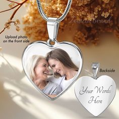 two heart shaped pendants with the words your words here