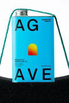 a blue can sitting on top of a black chair next to a green cord with the word ag written on it