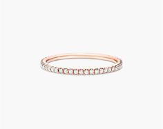 14K Rose Gold Single Row Ever After Diamond Ring. Delicately crafted in 14K rose gold, this single row diamond band is chic and timeless. Wear this simply beautiful band on its own or stack with other rings for a fashion forward look. Classic Stackable Rose Gold Diamond Ring, Rose Gold Diamond Band In Fine Jewelry Style, Rose Gold Diamond Round Cut Bands, Everyday Rose Gold Diamond Ring With Round Cut, Everyday Rose Gold Round Cut Diamond Ring, Classic Rose Gold Stackable Rings With Brilliant Cut, Classic Everyday Rose Gold Diamond Ring, Classic Rose Gold Diamond Stackable Rings, Everyday Rose Gold Diamond Ring With Single Cut Diamonds