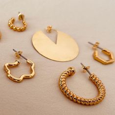 Welcome to AVINZIA, here you'll discover a stunning collection of affordable, tarnish-free gold jewelry featuring exclusive designs. Click on this link to explore our shop: https://www.etsy.com/shop/AVINZIA We pride ourselves on our quick response time, so don't hesitate to reach out with any questions! Please note that all sales are final. However, we offer store credit and exchanges within 14 days of delivery. Processing for exchanges takes 3-5 business days after delivery, and we reserve the right to refuse returns that don't meet our criteria. We also sell charms separately if you prefer! Not sure about the size? Reach out to us before placing your order, and we'll provide all the details you need. If you're looking for a custom item or your favorite product is out of stock, get in tou Trendy Gold-tone Jewelry With Matching Earrings, Trendy Gold-plated Jewelry, Minimalist Plated Hoop Earrings, Trendy Round Hoop Earrings With Plating, Everyday Gold Hoop Earrings With Plating, Trendy Gold Single Earring Jewelry, Trendy Round Hoop Earrings, Trendy Gold Single Earring, Gold-plated Metal Hoop Earrings