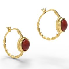 Les boucles d'oreilles romaines se ferment souvent sur le devant! Ces boucles d'oreilles ornées comportent une belle boucle torsadée et une pierre cabochon ronde maintenue dans un cadre de lunette sculpté magnifiquement délicat. Ils sont basés sur un exemple romain datant du IIIe siècle après JC.

Ces boucles d'oreilles sont disponibles en deux tailles de boucles, et avec différentes pierres indiquées ci-dessous, qui sont également présentées sur les photos. Veuillez indiquer votre choix de pier Yellow Gold Cabochon Drop Earrings, Elegant Yellow Gold Jewelry With Cabochon, Elegant Yellow Gold Cabochon Jewelry, Yellow Gold Gemstone Cabochons, Yellow Gold Cabochon Jewelry, Yellow Gold Round Cabochon Jewelry, Elegant Oval Hoop Earrings Hallmarked, Yellow Gold Cabochon Earrings For Anniversary, Elegant Oval Hallmarked Hoop Earrings