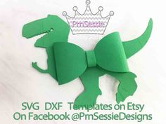 a green paper dinosaur with a crown on it's head and the words svg dxf templates on facebook