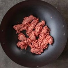 ground beef in a frying pan on a table