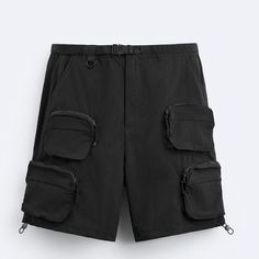 Regular Fit Shorts Made Of Stretch Technical Fabric. Adjustable Elastic Waistband With Tonal Matching Belt. Front Pockets And Back Welt Pockets. Multi-Functional Zip Pocket Appliqu At Legs. Adjustable Hem With Elastics At Sides. Front Zip And Snap Button Closure. Black Functional Nylon Bottoms, Functional Black Nylon Bottoms, Versatile Black Bottoms With Belt Loops, Black Cotton Cargo Shorts For Outdoor Activities, Black Cotton Cargo Shorts For Outdoor, Black Shorts With Side Pockets For Spring, Casual Nylon Cargo Shorts With Functional Pockets, Black Utility Bottoms For Outdoor Activities, Black Techwear Cargo Shorts For Outdoor