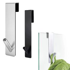 three different types of door handles on white and black doors with green towels hanging from them