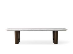 a white marble table sitting on top of a wooden stand with two legs and a black metal base