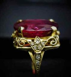 Oval Ruby Ring With Diamond, Luxury Oval Collectible Rings, Classic Oval Ruby Ring, Collectible Yellow Gold Oval Rings, Oval Yellow Gold Rings, Exquisite Oval Ruby Ring With Center Stone, Exquisite Oval Ruby Promise Ring, Oval Ruby Promise Ring, Exquisite Oval Diamond Ring With 17 Jewels