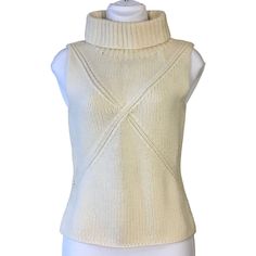 Trina Turk Los Angeles Sleeveless Turtleneck Patterned Knit Wool Sweater Medium Chic Sleeveless Textured Knit Sweater, Fitted Textured Knit Sweater Vest, Chic Fitted Knitted Sweater Vest, Chic Sleeveless Cable Knit Top, Fall Fitted Knitted Tank Top, Sleeveless Textured Knit Sweater, Fitted Sleeveless Cable Knit Vest, Fitted Sleeveless White Sweater, Fitted Cable Knit Sleeveless Vest