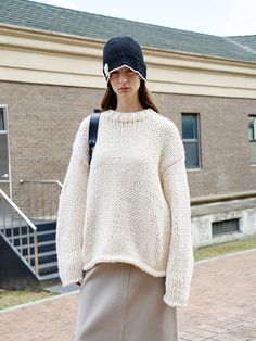 Editor's Notes The sweater has handmade craftsmanship knitting for a thick weave. Soft cotton yarn is used for a voluminous  puffy silhouette. - Balloon shaped design- Long sleeves- Loose fitting sweaterMeasurements(in.)ONE SIZE- Length: 25.0 in. - Shoulder: 23.03 in. - Chest: 24.02 in. - Bottom: 23.03 in. - Sleeve Length: 22.83 in. - Armhole: 10.04 in. - Cuff Opening: 4.72 in. - Neck Width: 9.06 in. - Neck Depth: 2.95 in.Composition & Care- 20% Wool  80% Acrylic- Dry cleaning Handmade Sweater, Balloon Shapes, Knitwear Fashion, W Concept, Mens Outerwear, Knitwear Women, Shape Design, Mens Bottom, Cotton Yarn