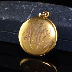 Beautiful Antique Victorian 10K Yellow Gold Engraved Locket Pendant. This classic locket is crafted in 14k yellow gold. The locket is plain and has an engraving of the previous owners initials on one side. A very beautiful and classic locket. Item #N0089 Metal: 10K Yellow Gold Weight: 7.8 Grams Size: 1 inch in diameter Measurements: The pendant is 1 inch in diameter and 5.52 mm deep. Layaway: For your convenience, we will be happy to provide layaway payment options. Please contact us to work out 14k Yellow Gold Locket Necklace For Anniversary, Elegant Hallmarked Locket Necklace For Formal Occasions, Classic Antique Gold Locket Necklace, 14k Gold Engraved Locket Necklace Gift, Engraved 14k Gold Locket Necklace As A Gift, Classic 14k Gold Locket Necklace Keepsake, Classic 14k Gold Locket Necklace With Polished Finish, Classic 14k Gold Locket Necklace For Keepsake, Victorian Yellow Gold Locket Necklace For Anniversary