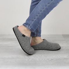 Sanita Faroe Unisex Slipper In Slate-460006-056 Sanita isn't just for workwear clogs! Our Faroe indoor house slipper in Slate combines the best in all-day comfort with Danish minimalist design. These slippers are made from 100% natural wool felt and feature removable arch-supporting, wool-lined footbeds. Whether your lounging or working at home, these slippers will keep you comfy and supported. Wear them with or without socks; there are no itchy or scratchy materials and there'll be no smell, th Indoor Closed Toe Clogs With Cushioned Footbed, Comfortable Clogs With Textured Footbed, Comfortable Everyday Slippers With Rubber Sole, Comfortable Indoor Clogs With Round Toe, Winter Non-slip Slip-on Clogs, Casual Gray Slippers With Textured Footbed, Comfortable Gray Slippers With Textured Footbed, Gray Closed Toe Casual Slippers, Non-slip Winter Slip-on Clogs