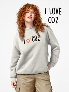 This is a playful and thought-provoking image that proudly declares "I love CO2."  This image challenges perceptions and encourages a deeper understanding of the complexities surrounding climate change and carbon emissions. Whether sparking light-hearted banter or prompting meaningful discussions, "I love CO2" is a whimsical reminder that every aspect of our world deserves consideration and exploration. Pride Parade Outfit, Grammar Humor, Team Pink, Funny Relationship, Lightweight Hoodie, Womens Swimwear