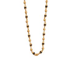 Classic design single strand mangalsutra chain in a mix of yellow and black beads (0.54 grams), handcrafted in 22 karat yellow gold. This everyday wear long slip over the head design is the perfect light-weight jewelry pick.Need a size check? Refer to our necklace size guide. Traditional 22k Gold Necklace With Delicate Chain, Traditional Festive Necklace With Delicate Chain, Traditional Gold Plated Chain Necklace, Traditional Festive Chain Necklaces, Gold Necklace With Black Beads For Puja, Gold Jewelry With Black Beads For Puja, Gold Necklace With Black Beads For Festive Occasions, Traditional Gold Necklace With Black Beads, Gold Long Necklace With Black Beads