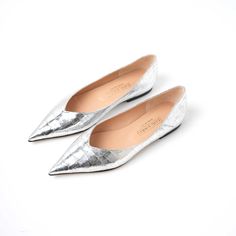 a pair of very pointy flat slip on shoes on a white background. upper consists of shiny metallic silver crocodile emboss leather and tan colored leather lining. Silver Flat Shoes, Pointed Flats Shoes, Pointy Flats, Metallic Flats, Pointed Flats, Silver Flats, Leather Flat Shoes, Ballerina Shoes, How To Make Shoes