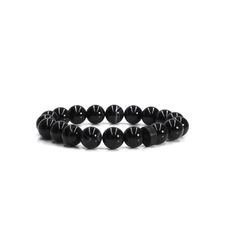 Discover the timeless beauty of the Noire Stone Bracelet. Crafted with the utmost precision, the smooth and stunning black tiger eye stone beads form an alluring combination that effortlessly enhances any ensemble. The addition of the matte black logo bead adds a touch of boldness and an effortlessly cool look. - 10mm black tiger eye stone beads- Black plated eLiasz and eLLa logo bead- Bracelet is stretchable, stackable and made with natural, cut & conditioned stones- Signature jewelry pouch inc Adjustable Black Wristband With Gemstone Beads, Modern Black Bracelet With 8mm Beads, Black Onyx Beaded Bracelets With Polished Beads, Modern Black Bracelets With 8mm Beads, Black Stretch Bracelet With Polished Beads, Modern Black Round Bead Bracelets, Black Onyx 8mm Beads Stretch Bracelet, Black Onyx Stretch Bracelet With 8mm Beads, Black Gemstone Beads Stretch Bracelet