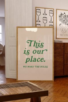 this is our place we make the rules poster in front of a table with chairs