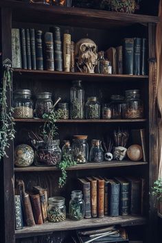 an old bookshelf filled with lots of books and other things on top of it