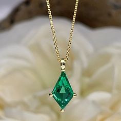 "Emerald Pendant Necklace Solid 14K Yellow Gold , Ladies Emerald Necklace Unique Kite Shaped Emerald Necklace Pendant Dainty Necklace The pendant pictured is emerald for emerald earrings click here: https://etsy.me/3AN4nqW   for emerald rings click here: https://etsy.me/3JIov0a for emerald pendants click here: https://etsy.me/3Td2gnv -Approximate total carat weight:  approx. 2.00ctw diamond equivalent  -Center Stone Size:  12x7mm - approx 2.00ct. diamond equivalent  -Center Stone Shape: Kite -Ge Luxury Elegant Pear-shaped Emerald Necklace, Luxury Formal Emerald Necklace With Rectangular Pendant, Large Emerald Necklace, Emareld Necklace, Gold Necklace With Emerald, Emerald Jewelry Gold, Emerald And Gold Necklace, Classic Diamond Cut Necklace For May Birthstone, Formal Diamond Cut Necklace For May Birthstone